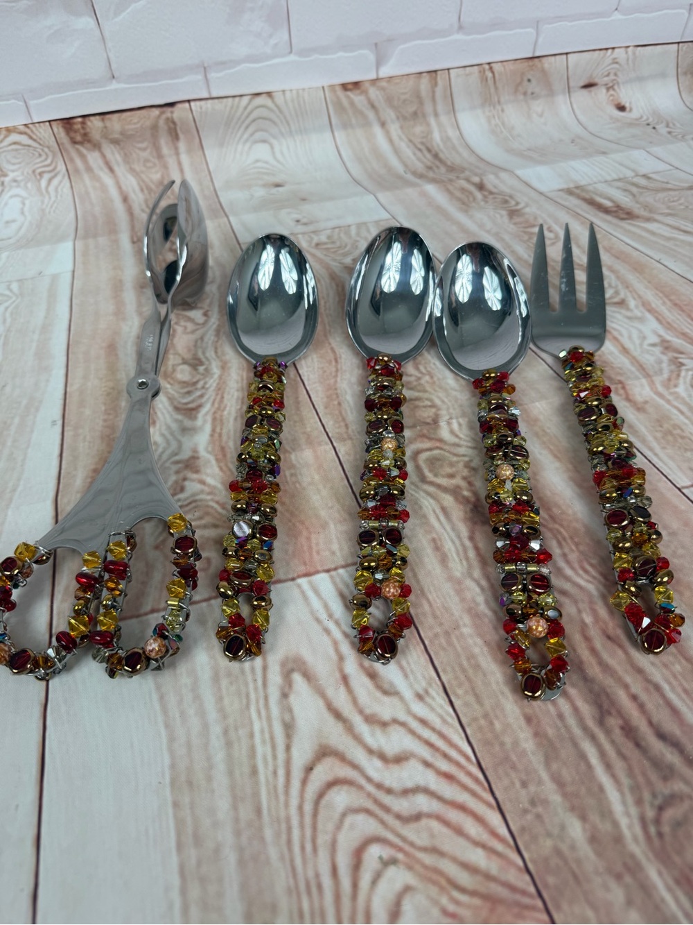 Oneida Beaded Handle Serving Spoon and Fork Set in Red and Gold